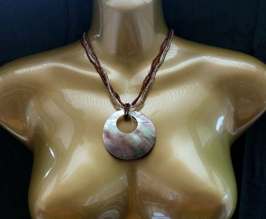 MOTHER OF PEARL CIRCLE PENDANT ON BEADED NECKLACE