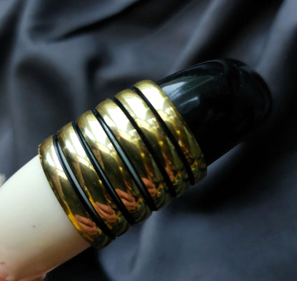 CREAM AND BLACK BANGLE WITH GOLD RIBBED DETAIL